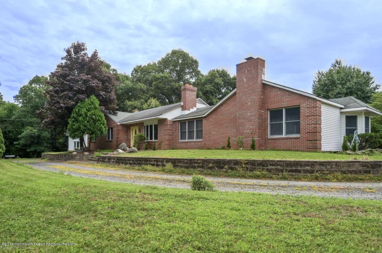 a view of a house with a big yard