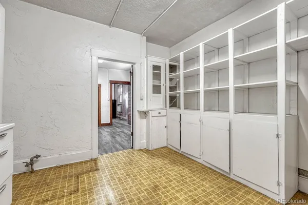a bathroom with a toilet and a bathtub