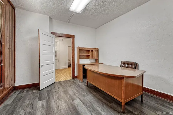 a kitchen with stainless steel appliances a refrigerator and a stove
