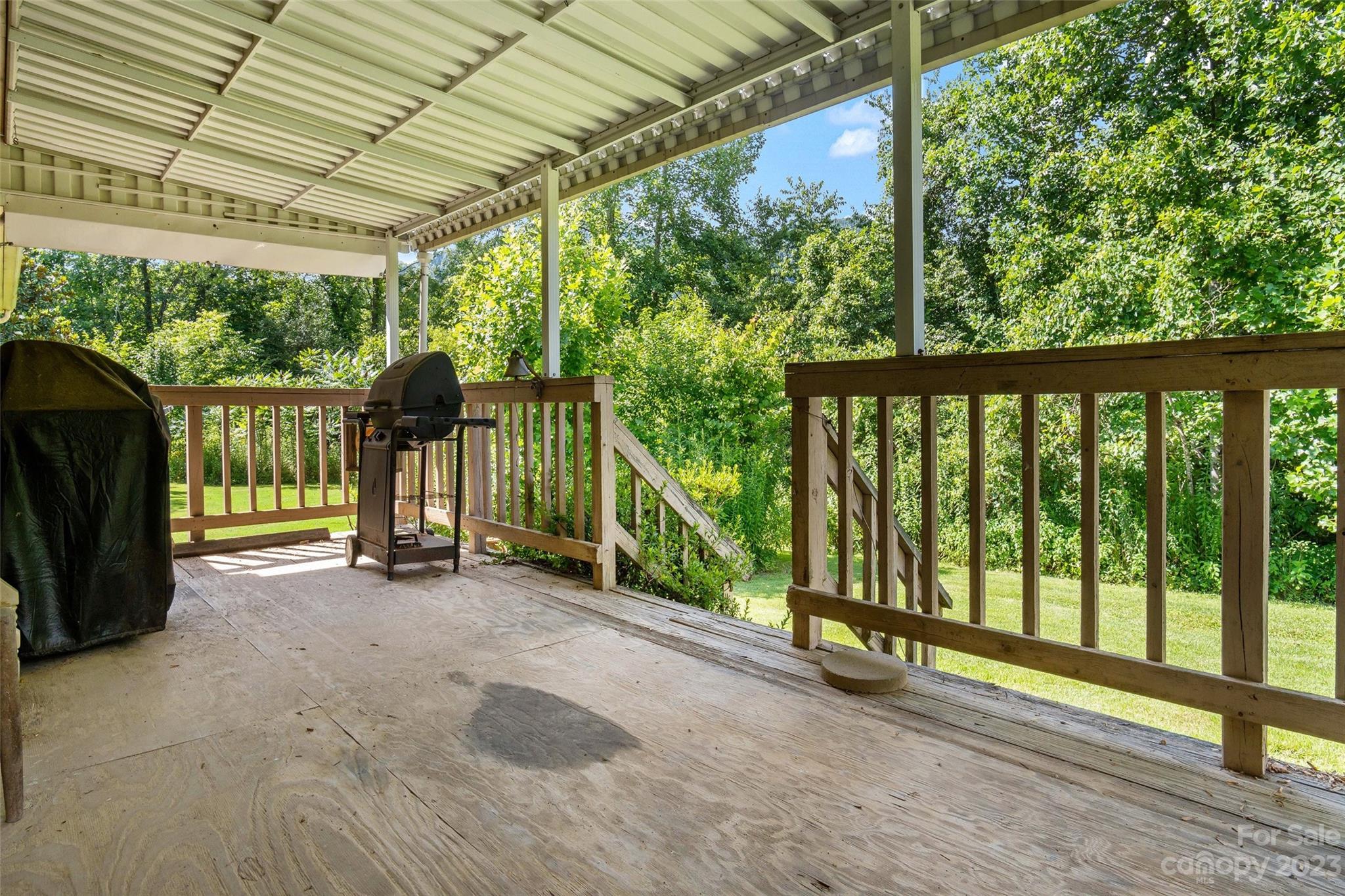 5232 Bat Cave Road Old Fort, NC 28762 - Photo 13 of 32 a view of porch with a backyard
