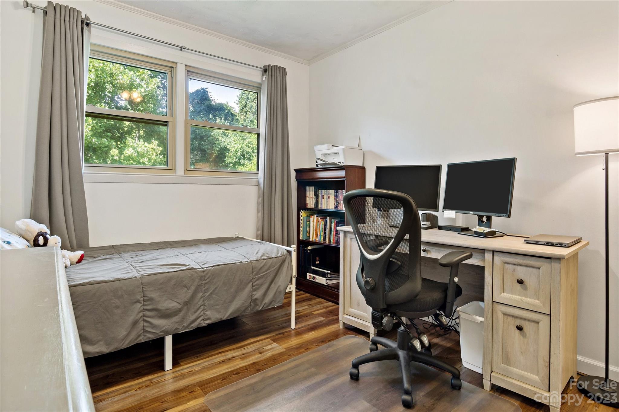 5232 Bat Cave Road Old Fort, NC 28762 - Photo 20 of 32 a bedroom with a workspace