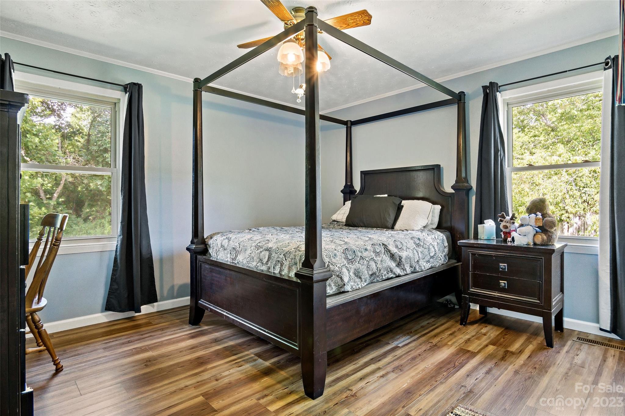 5232 Bat Cave Road Old Fort, NC 28762 - Photo 24 of 32 a bedroom with a bed and a window
