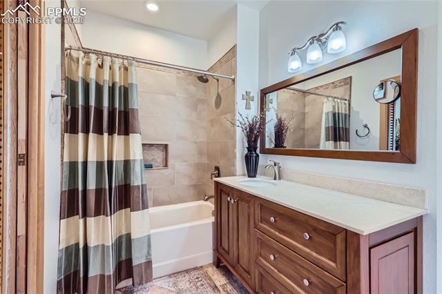 903 High Road Manitou Springs, CO 80829 - Photo 24 of 49 Handsome tile and flooring in this primary bathroom.