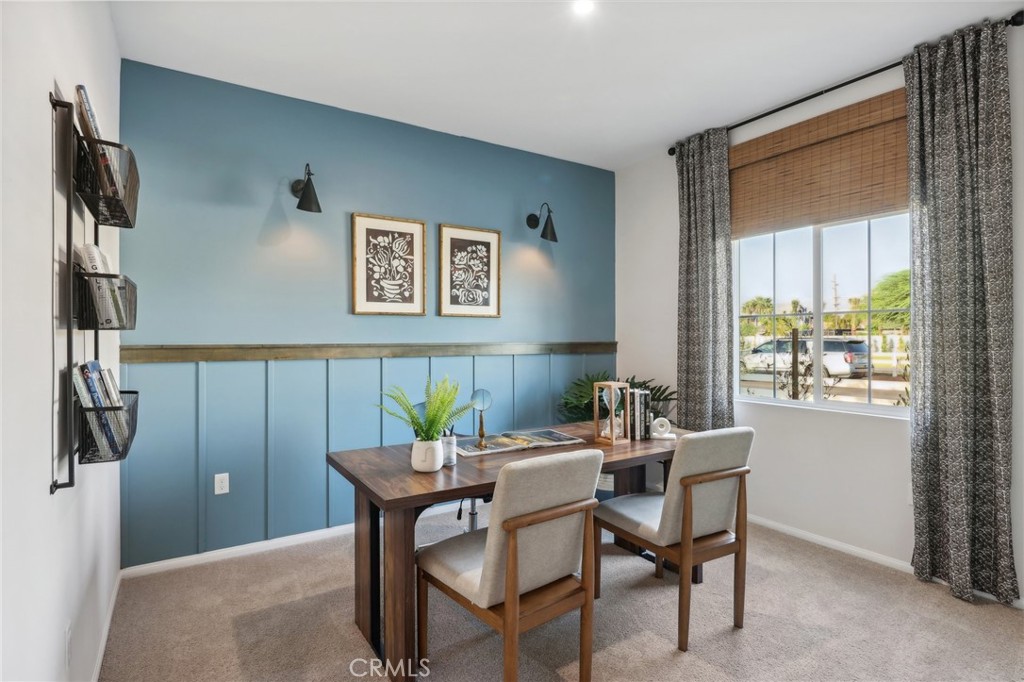 83241 Thrush Way Indio, CA 92201 - Photo 15 of 33 a view of a dining room with furniture window and outside view