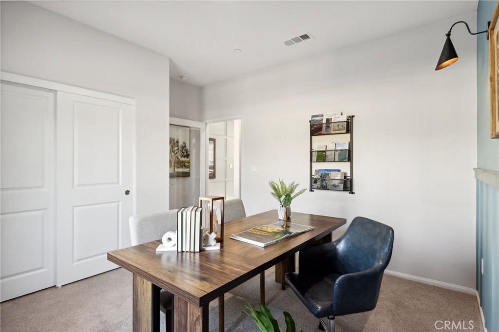 83241 Thrush Way Indio, CA 92201 - Photo 16 of 33 a view of a workspace with furniture