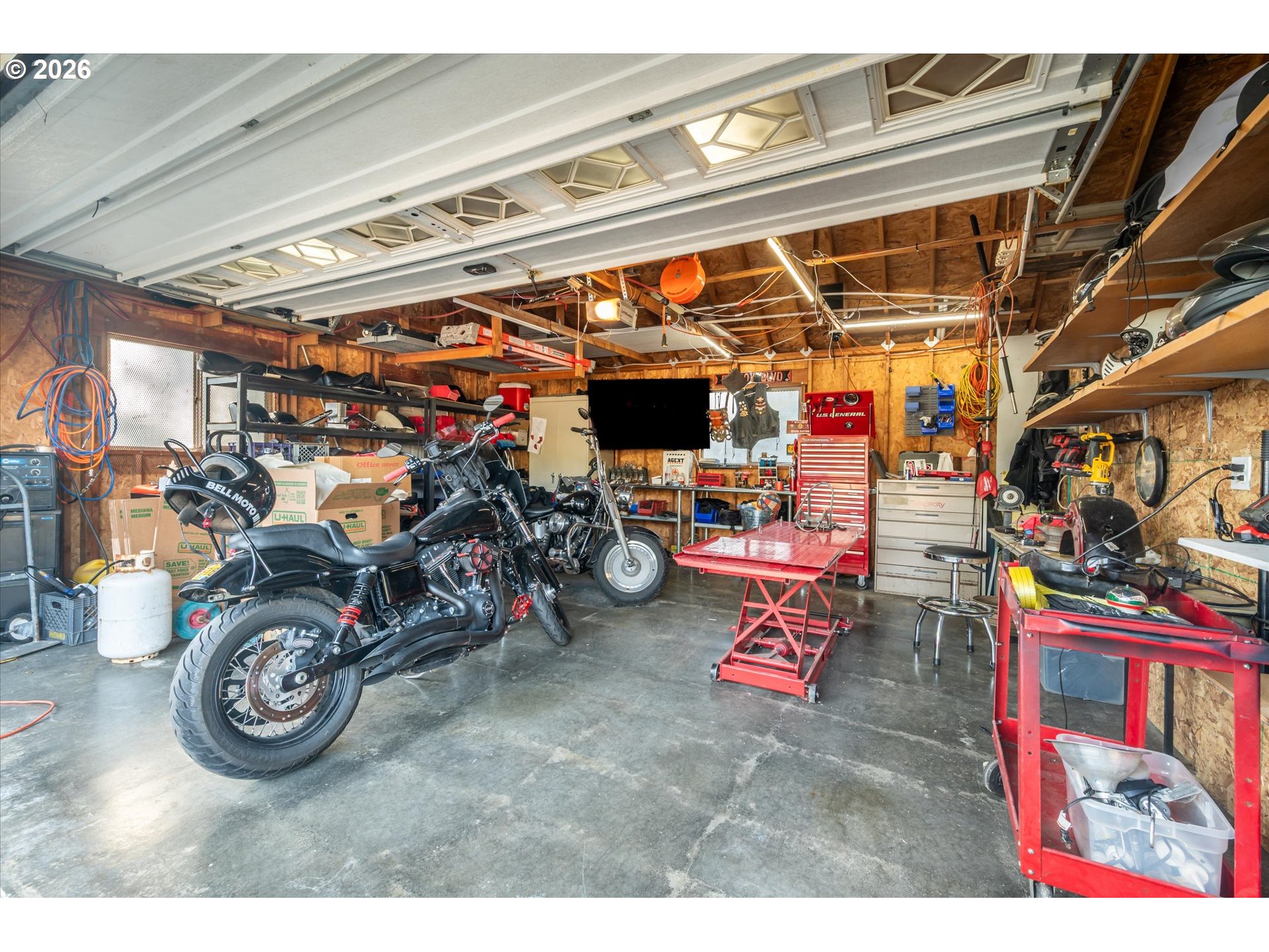 1789 14th Street North Bend, OR 97459 - Photo 34 of 43 a view of a storage room with a lot of stuff