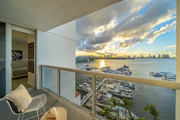 a view of a balcony with an ocean view