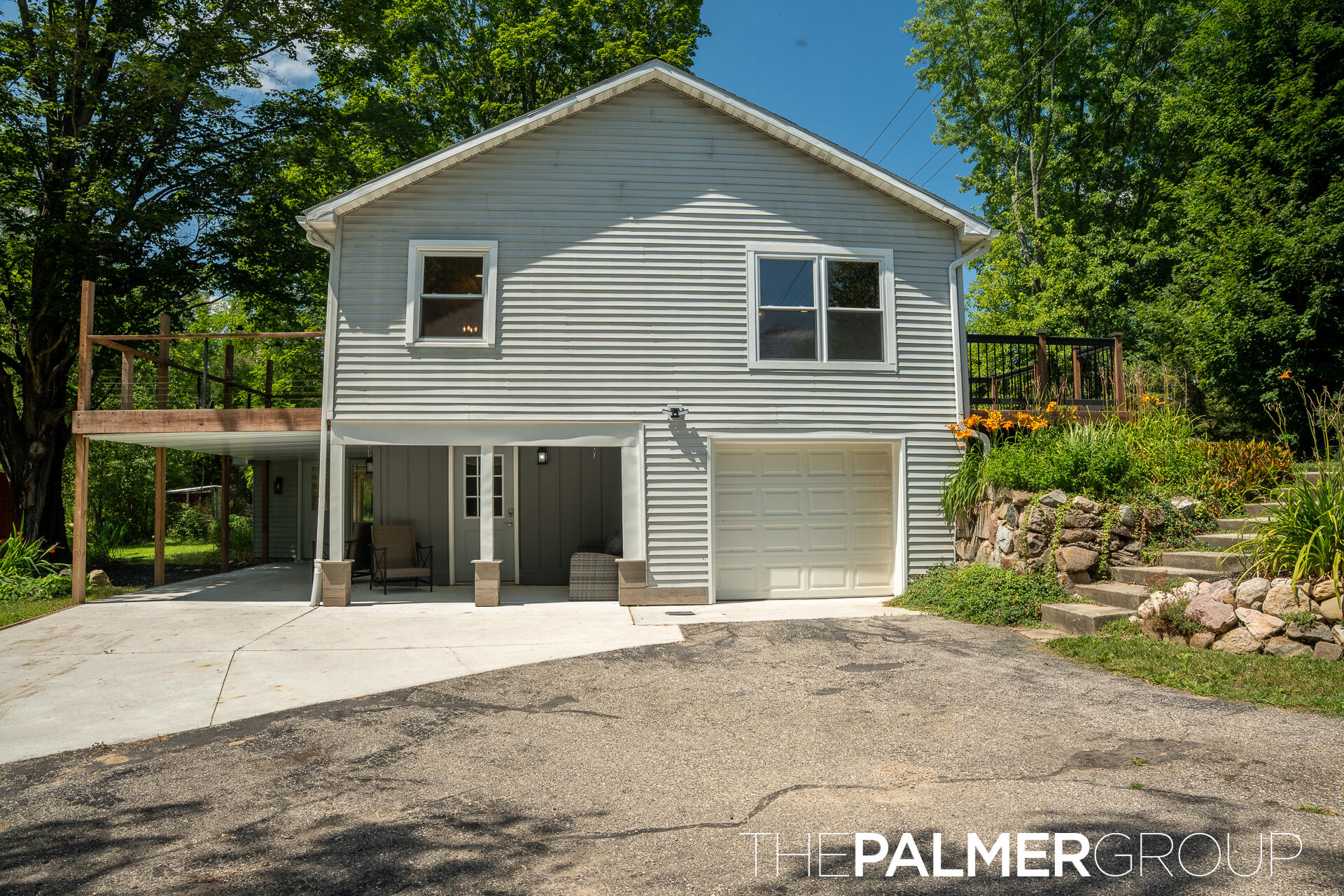 23419 22 Mile Road Paris, MI 49338 - Photo 32 of 53 East Exterior with Garage, Patio, Deck