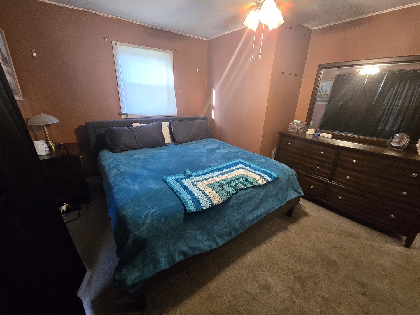 15035 Harding Avenue Midlothian, IL 60445 - Photo 14 of 32 a bed sitting in a bedroom next to a window