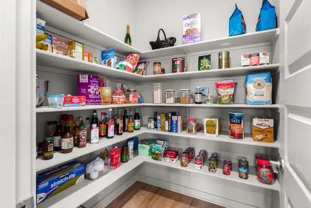 a kitchen with a sink and a couch