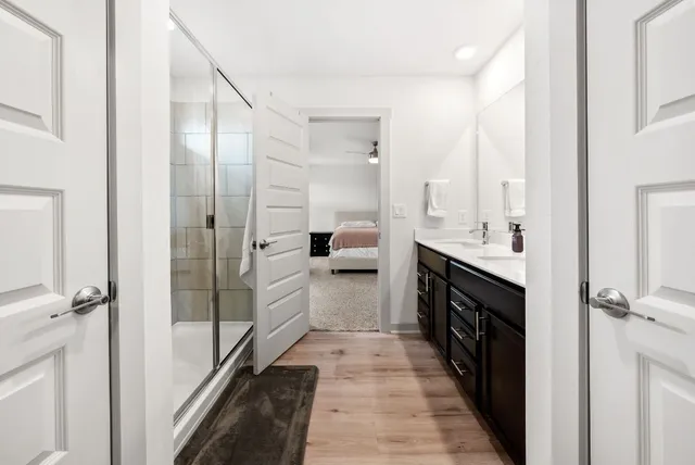 a spacious bedroom with a bed and window