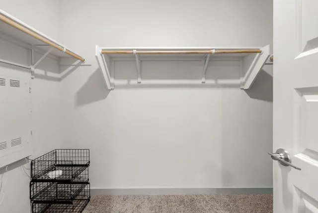 a en suite bathroom with a sink and a mirror