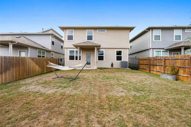 a view of storage and utility room with washer and dryer