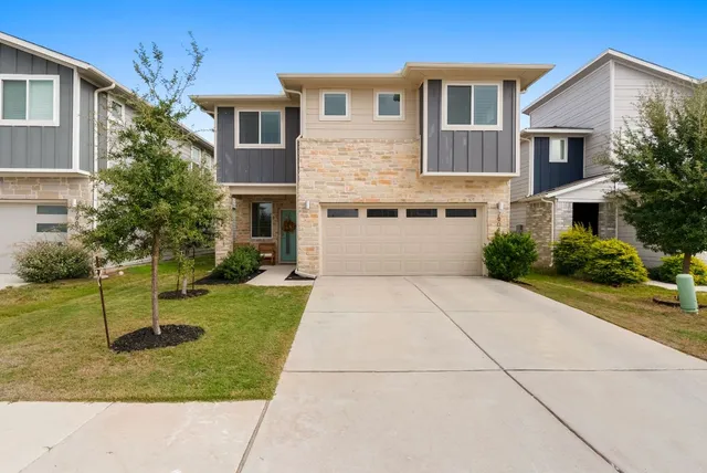 a front view of house with yard