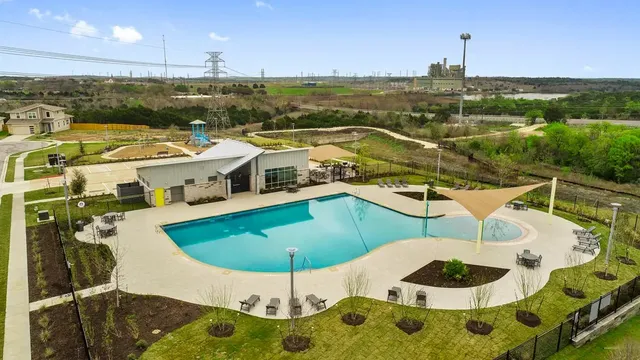 a house view with a backyard space