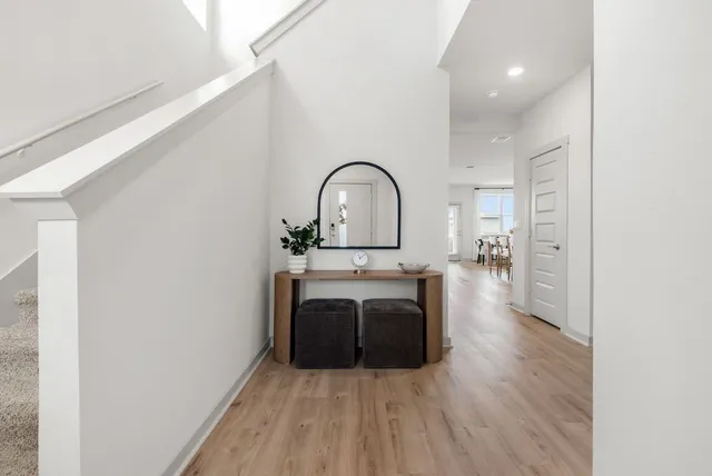 a view of kitchen with sink and wooden floor