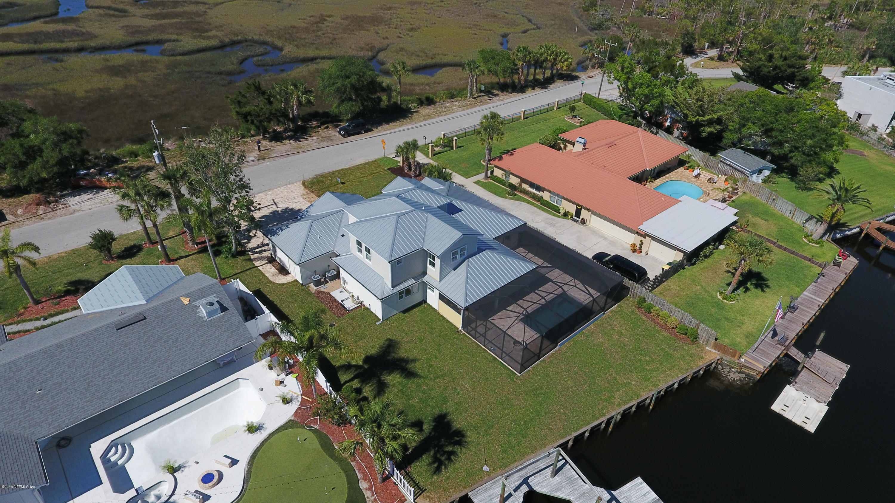 14712 Stacey Road Jacksonville, FL 32250 - Photo 2 of 26 an aerial view of a house with a swimming pool