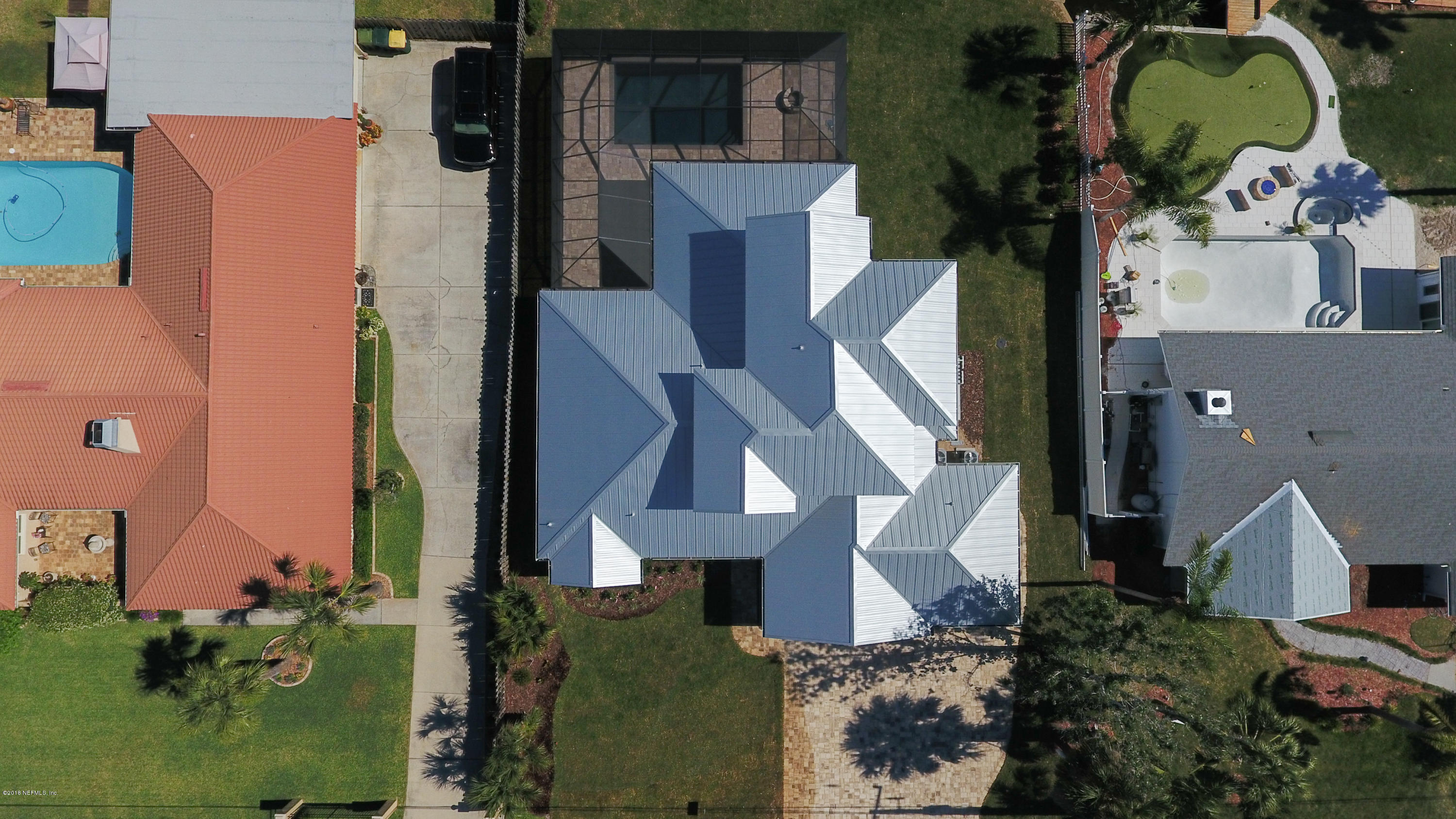 14712 Stacey Road Jacksonville, FL 32250 - Photo 4 of 26 an aerial view of a house with a yard and fountain