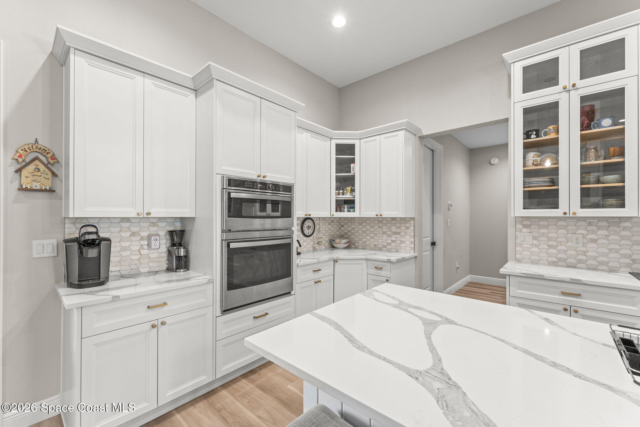 1740 Ford Road Mims, FL 32754 - Photo 18 of 43 a kitchen with a refrigerator stove and sink