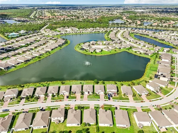 a view of a city with an ocean