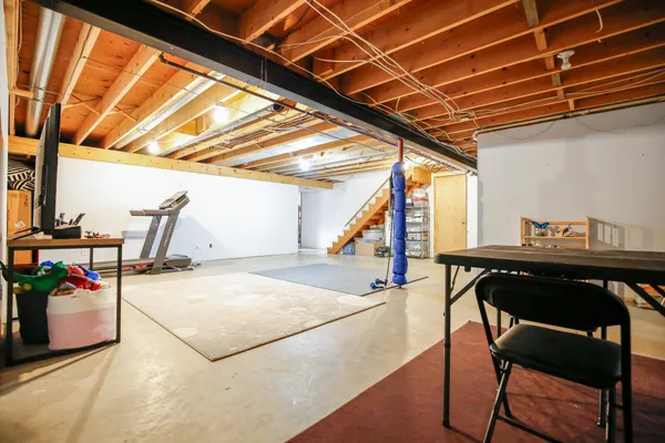 a view of a workspace with furniture