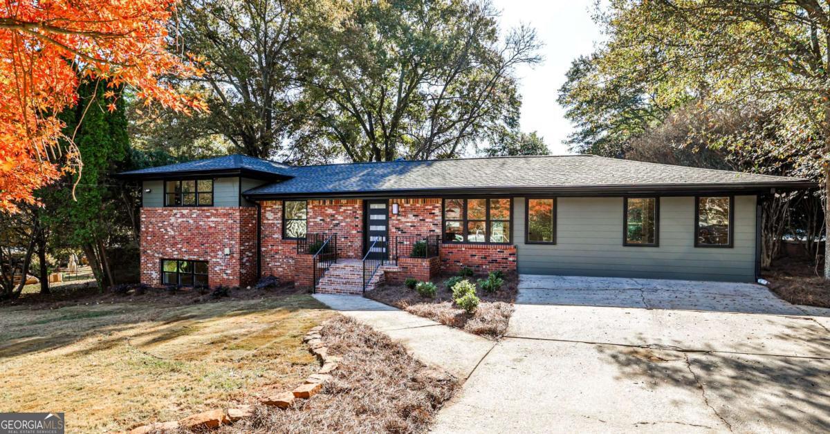 a front view of a house with a patio
