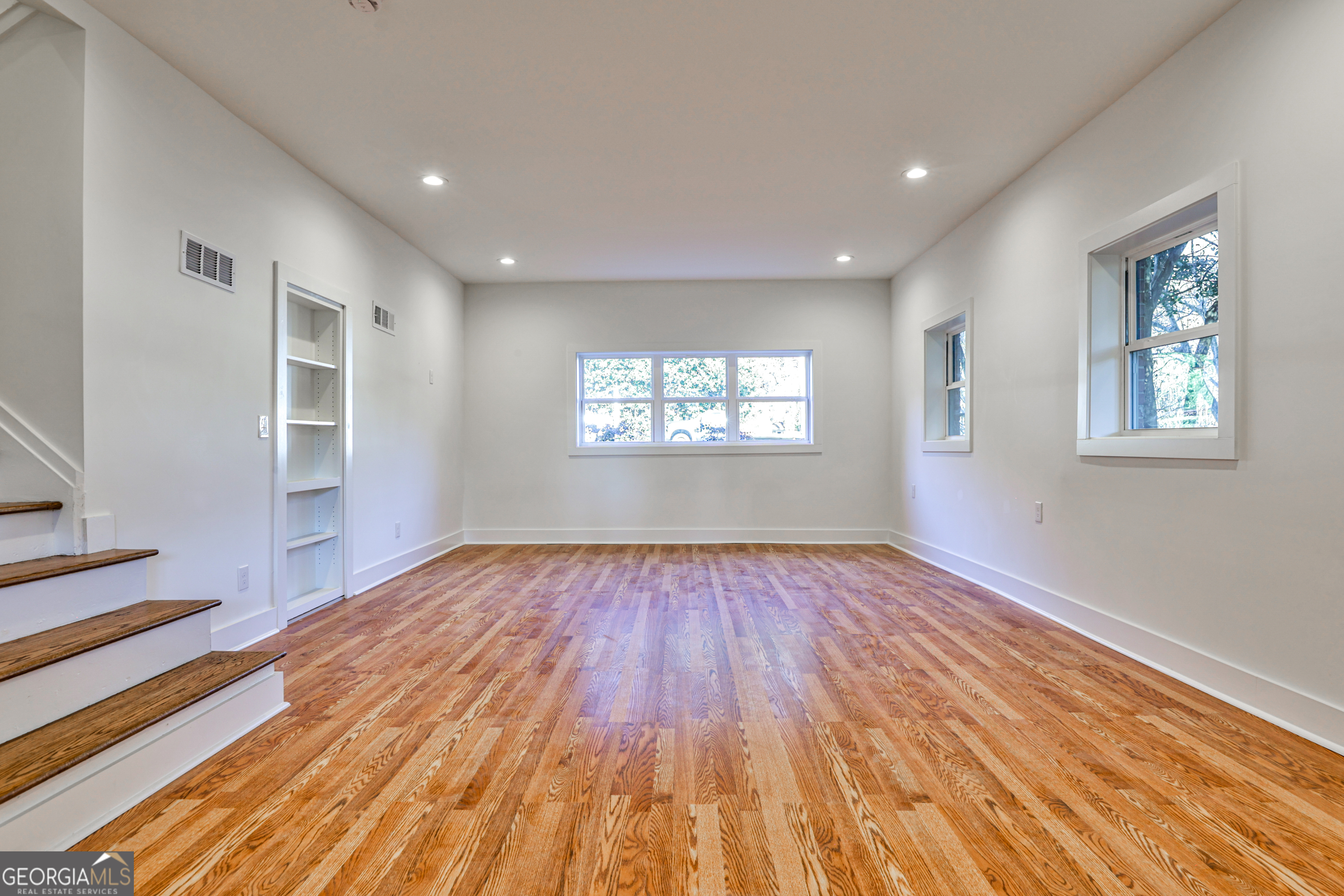 3029 Charlbury Place Avondale Estates, GA 30002 - Photo 12 of 27 a view of an empty room window and wooden floor