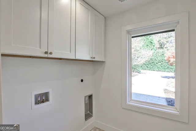 a view of window with kitchen view