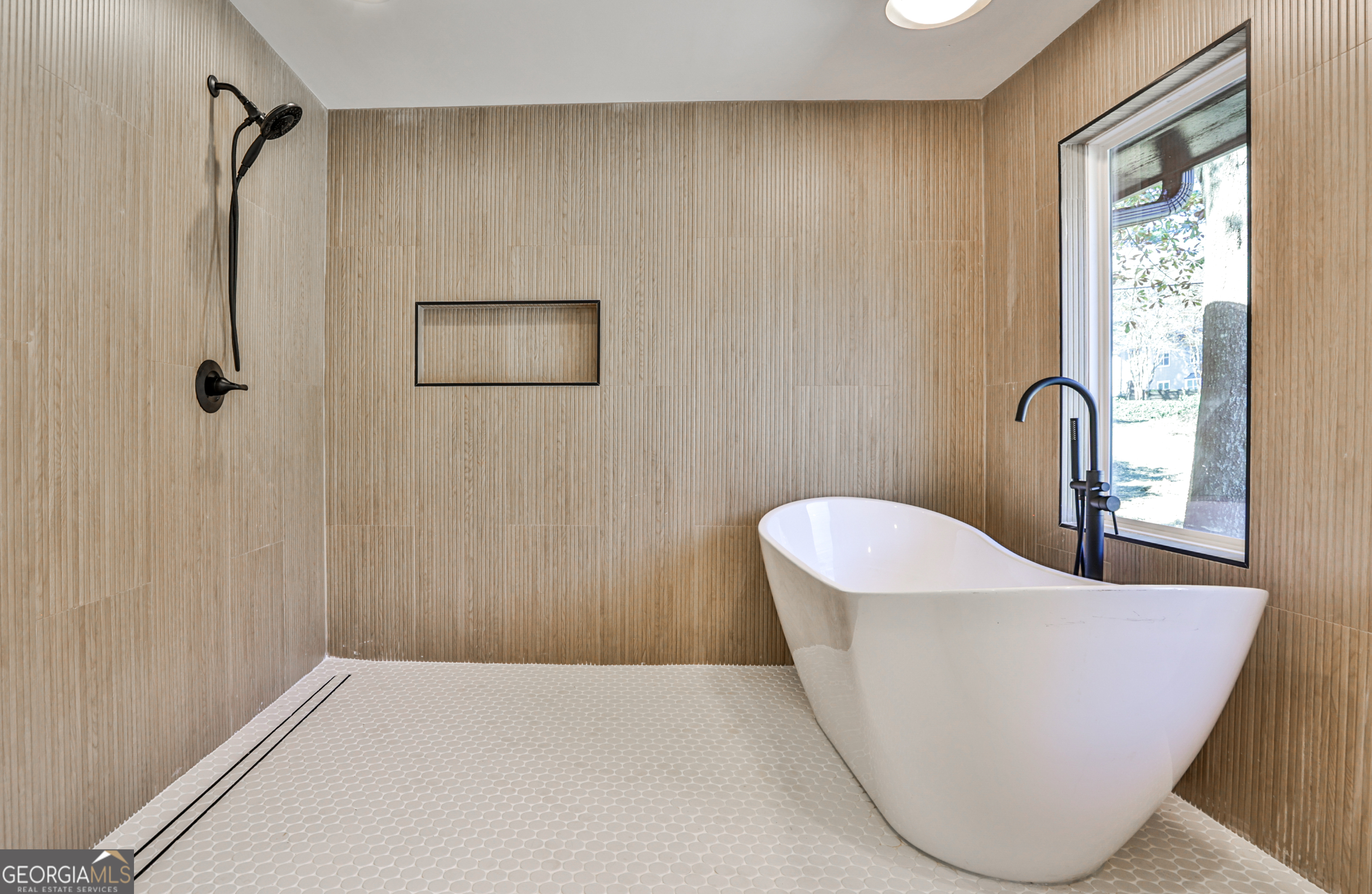 3029 Charlbury Place Avondale Estates, GA 30002 - Photo 23 of 27 a view of a bathtub in a bathroom