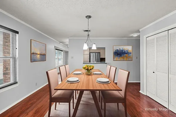 a kitchen with a sink stove and refrigerator