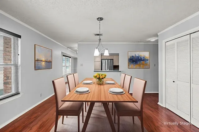 a kitchen with a sink stove and refrigerator