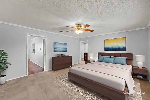 a bathroom with a granite countertop sink a mirror and a bathtub