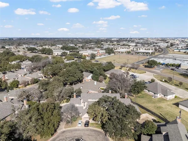 a view of a house with a garden