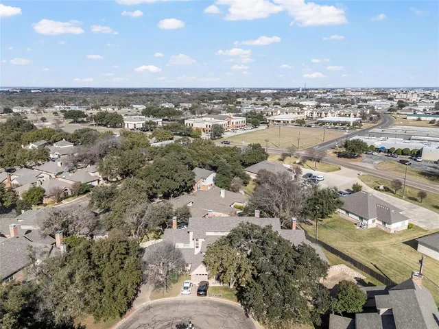 a view of a house with a garden