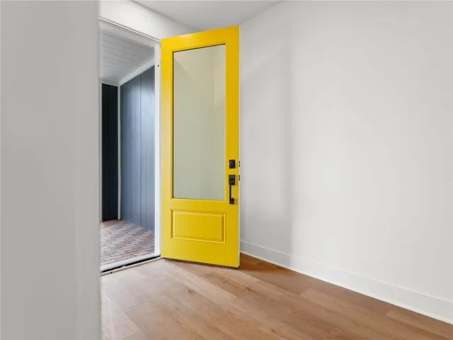 an empty room with a door
