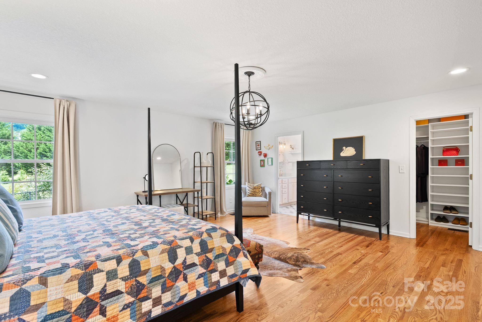 6 Sayles Town Road Fairview, NC 28730 - Photo 16 of 43 a bedroom with a bed and a television