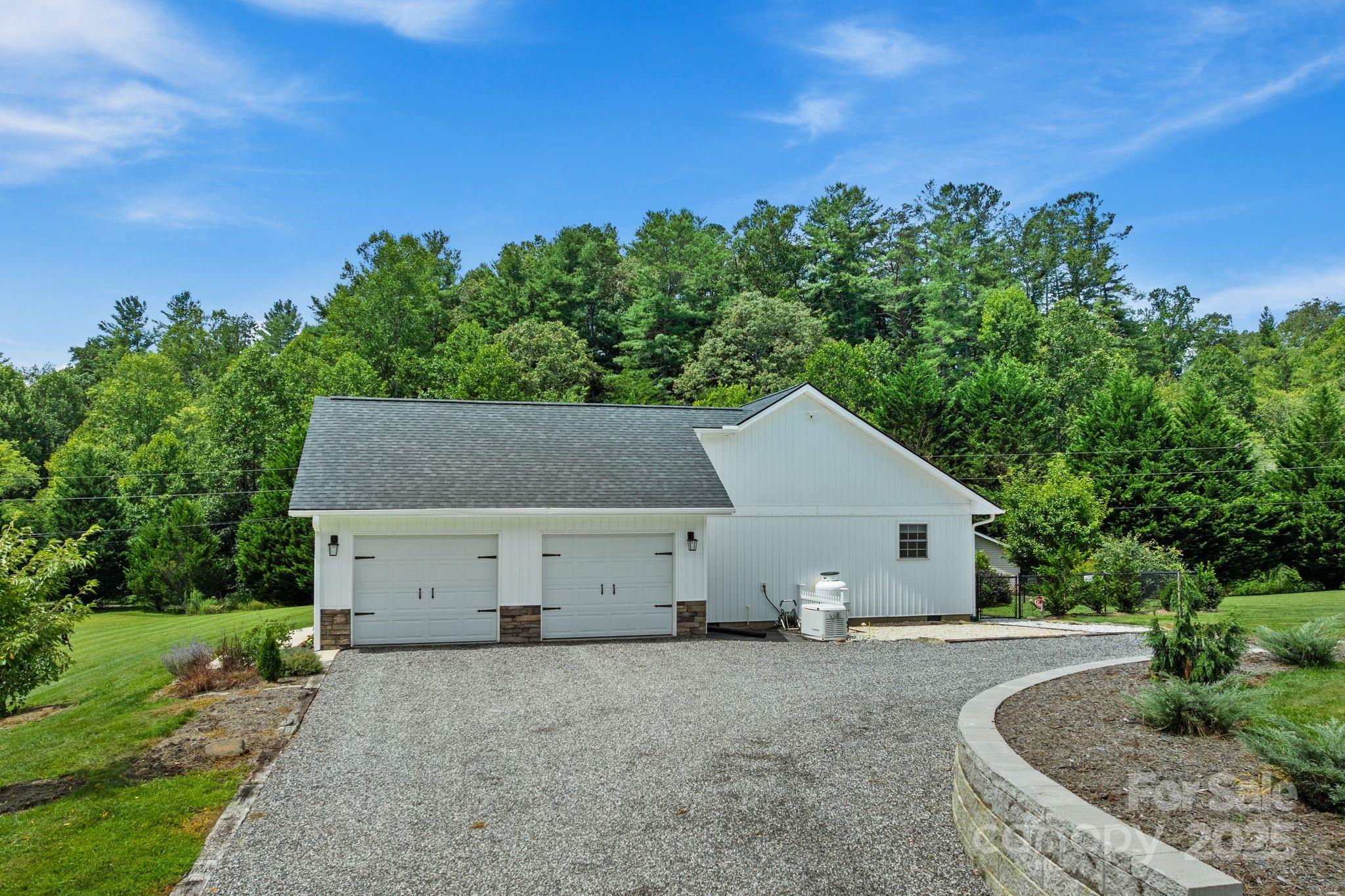 6 Sayles Town Road Fairview, NC 28730 - Photo 36 of 43 a house view with a garden space