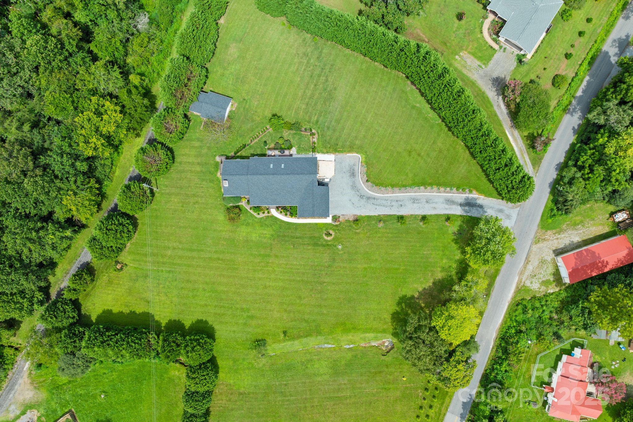6 Sayles Town Road Fairview, NC 28730 - Photo 39 of 43 an aerial view of a house with a garden