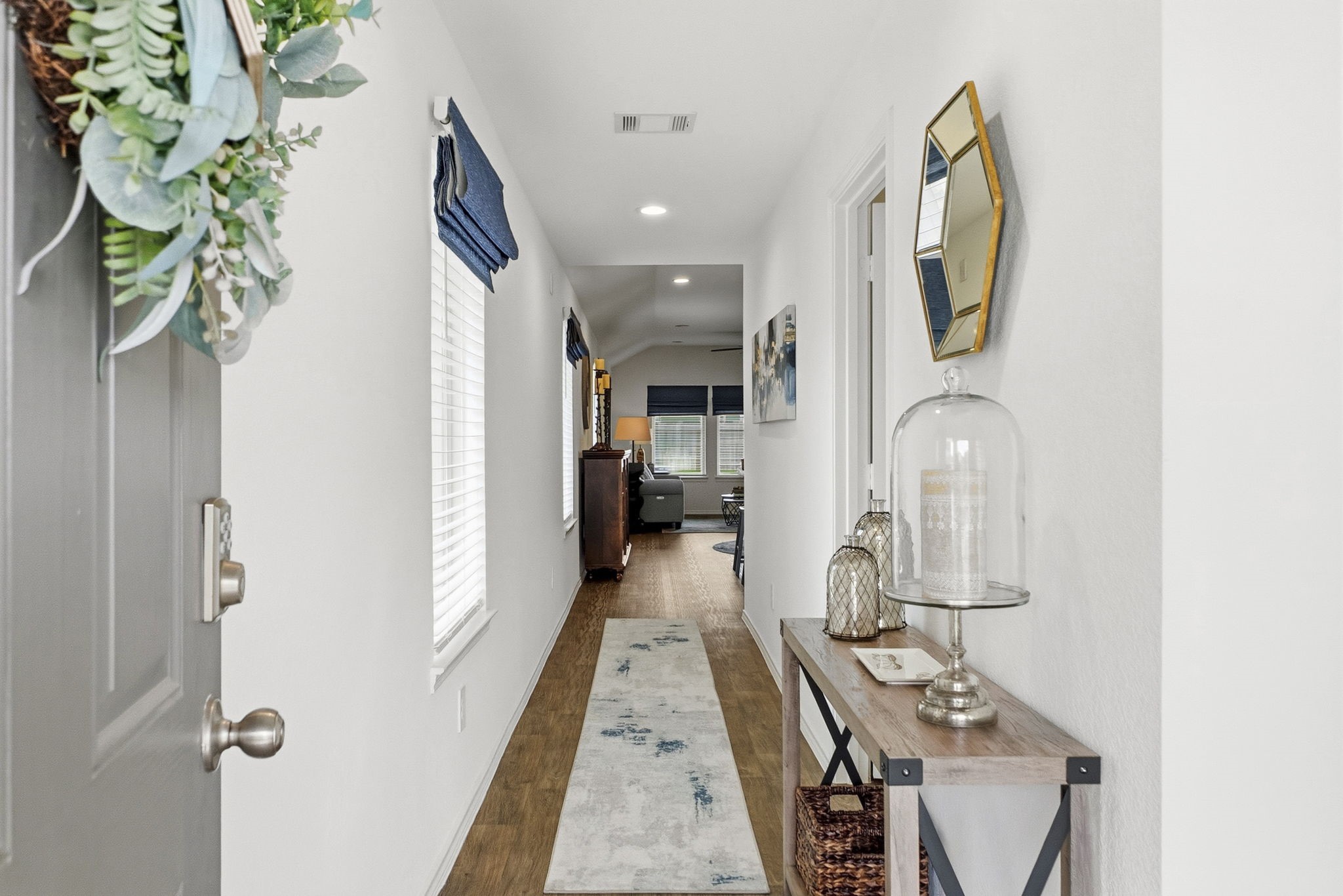 14114 Sandy Pnes Court Conroe, TX 77302 - Photo 5 of 43 Inviting Entry Way with a coat closet
