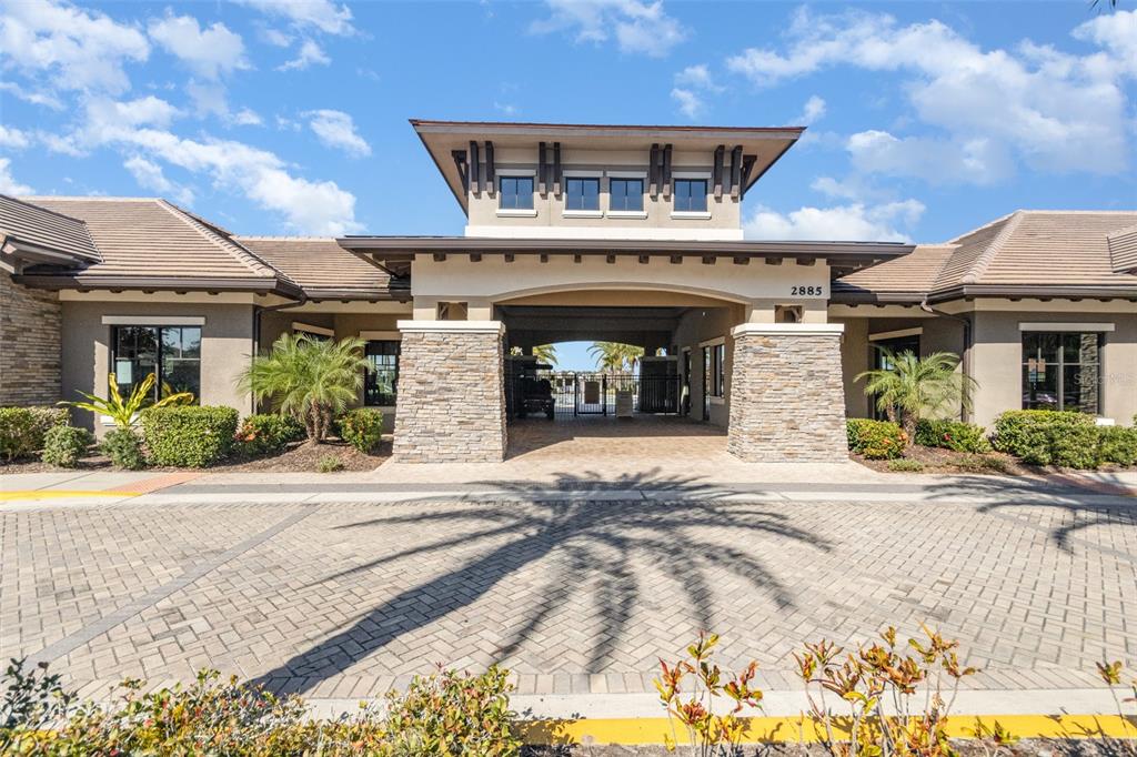 2461 Avian Loop Kissimmee, FL 34741 - Photo 30 of 36 a front view of a house with garden