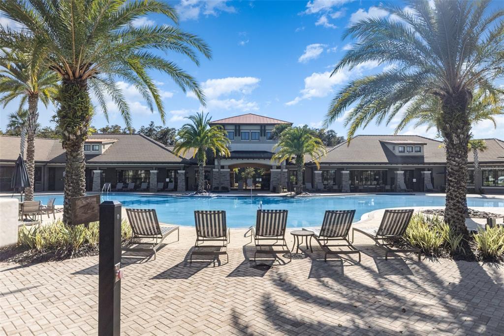2461 Avian Loop Kissimmee, FL 34741 - Photo 33 of 36 a front view of house with yard and outdoor seating