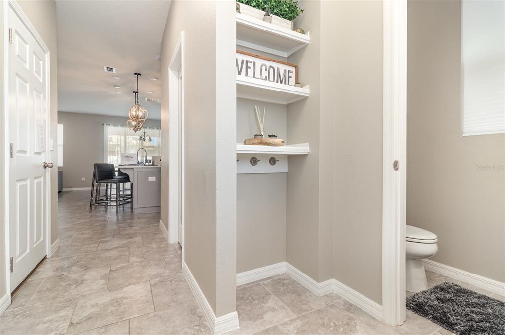 2461 Avian Loop Kissimmee, FL 34741 - Photo 4 of 36 a view of livingroom with furniture and wooden floor