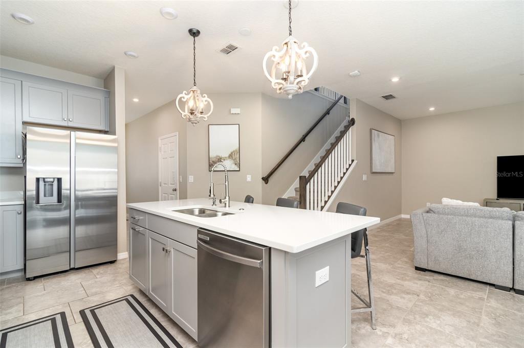 2461 Avian Loop Kissimmee, FL 34741 - Photo 9 of 36 a very nice looking dining room with a table and chairs