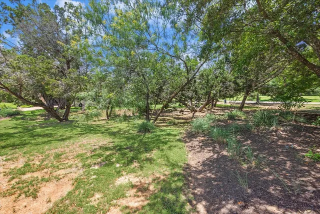 an aerial view of house with yard