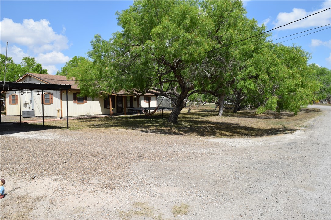 a house with trees in front of it