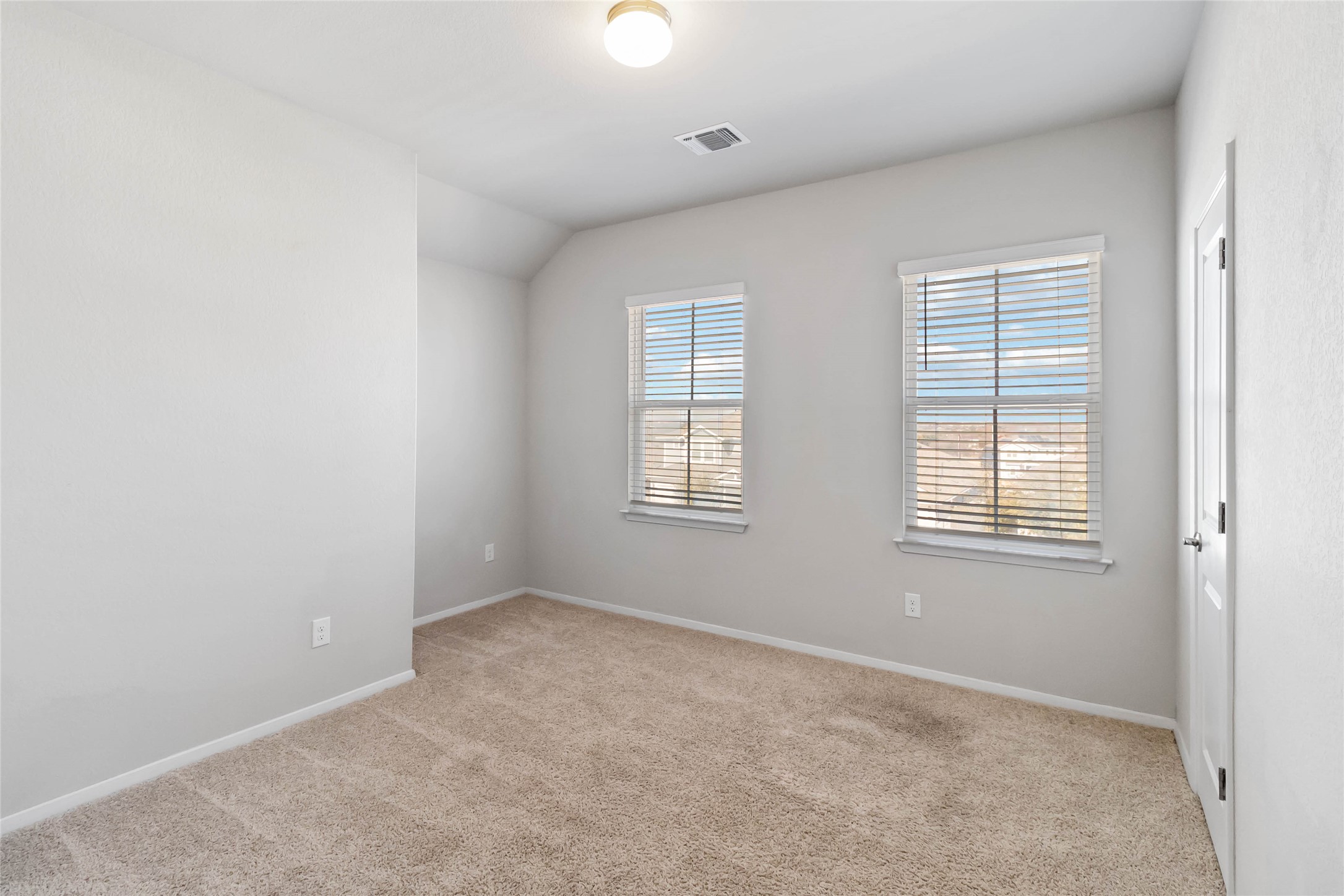 5613 Respinto Drive Austin, TX 78747 - Photo 25 of 38 an empty room with windows