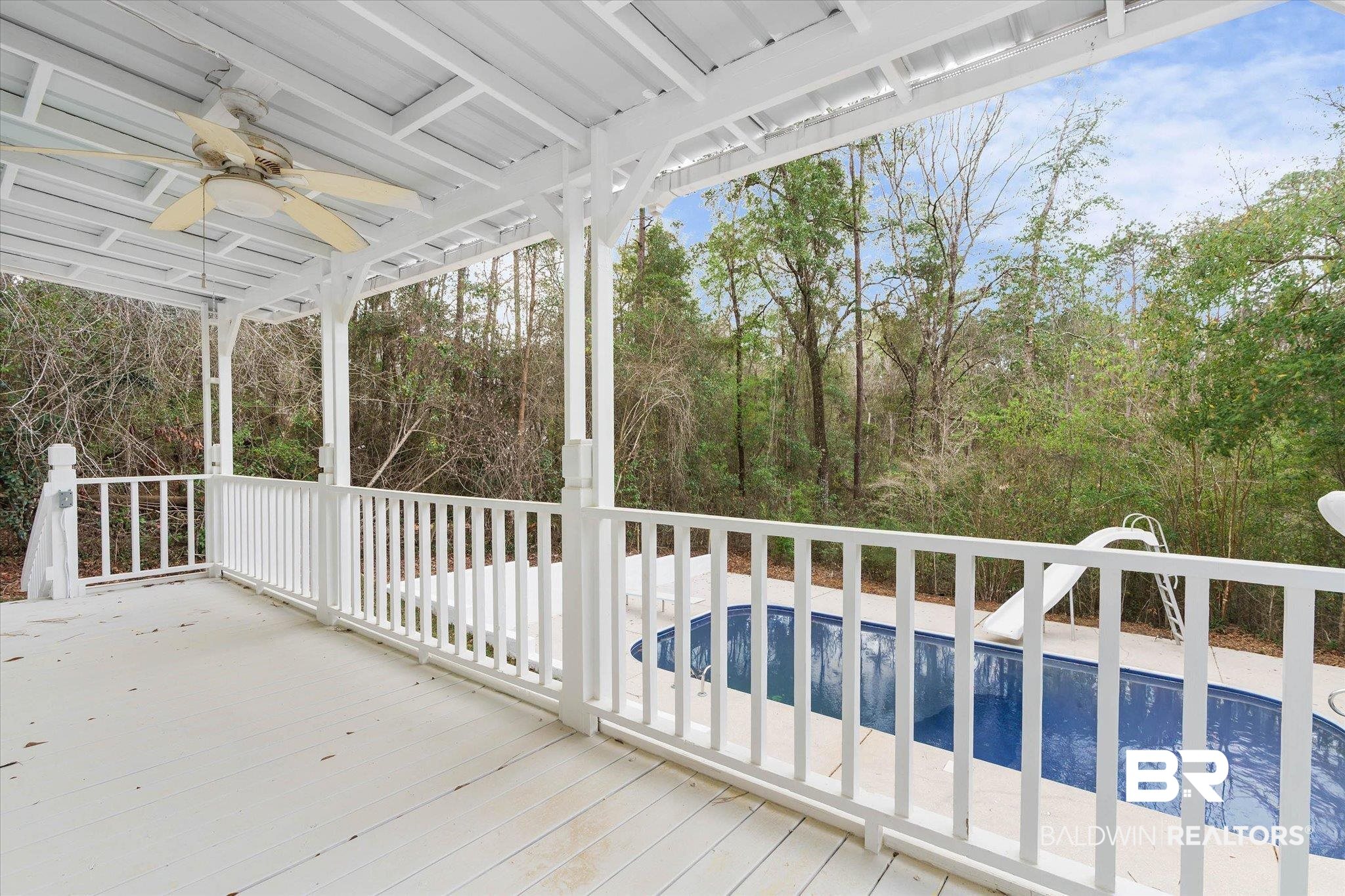 106 Melanie Loop Daphne, AL 36526 - Photo 31 of 45 Deck with a ceiling fan and an outdoor pool