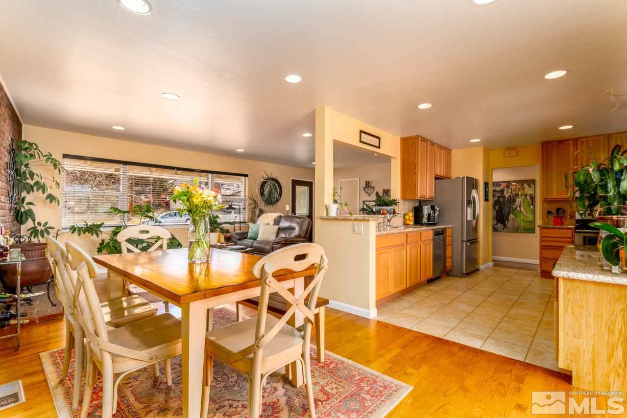 655 Amber Circle Reno, NV 89509 - Photo 3 of 31 a kitchen with a table and chairs