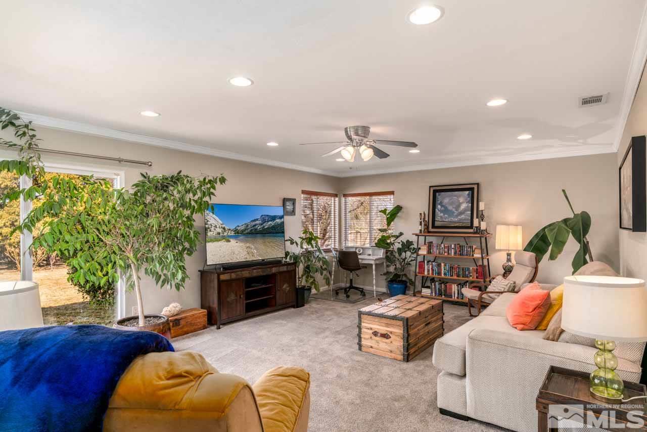 655 Amber Circle Reno, NV 89509 - Photo 10 of 31 a living room with furniture and a fireplace