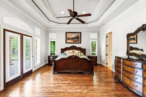 a bed room with a bed and a fireplace